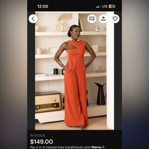 Orange one shoulder silk jumpsuit size small